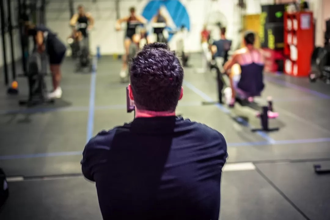 Member training during a coached strength and conditioning session